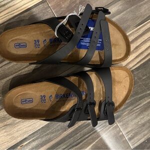 Birkenstock Black Sandals with Adjustable Straps and Cork Footbed